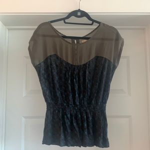 Dark patterned peplum top